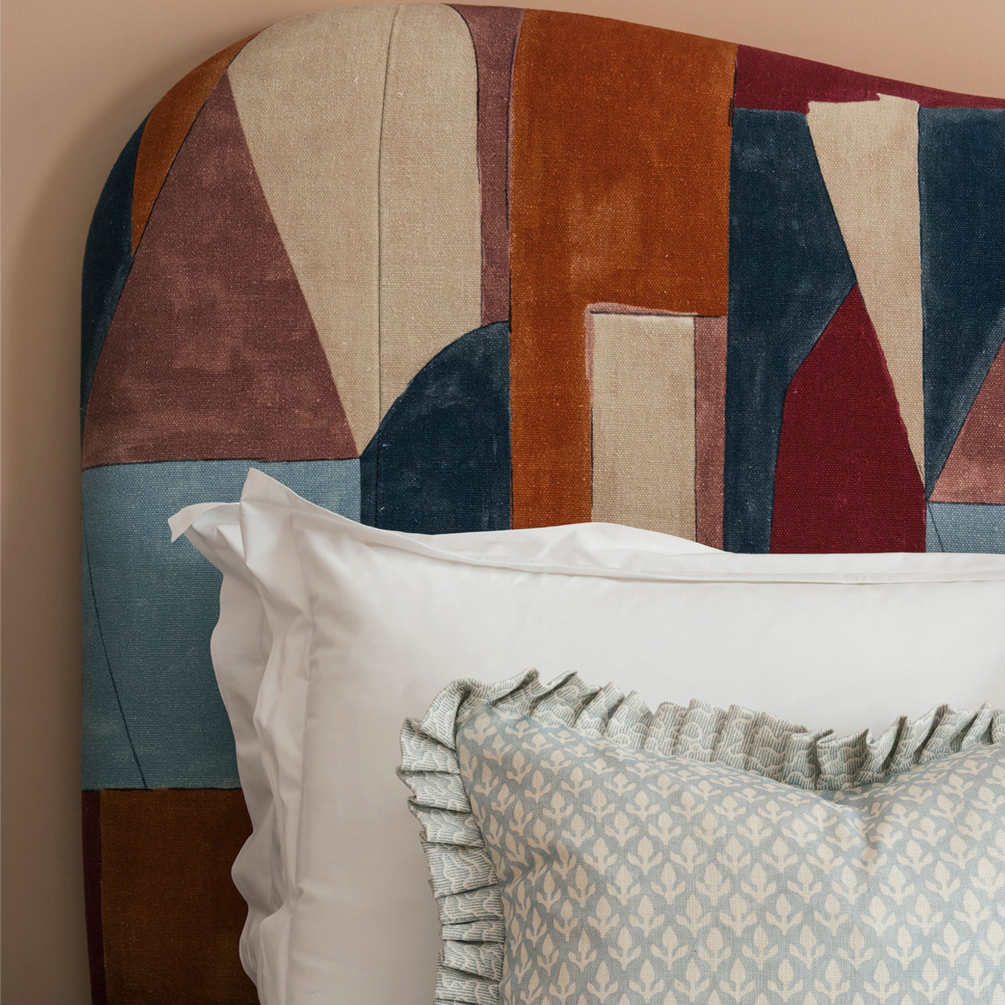Close up of geometric patterned Upholstered Bed with Curved Headbaord and end-lift Ottoman Storage, Contemporary Interiors, Online Shopping, Craftsmanship, Wooden feet, Bazaar