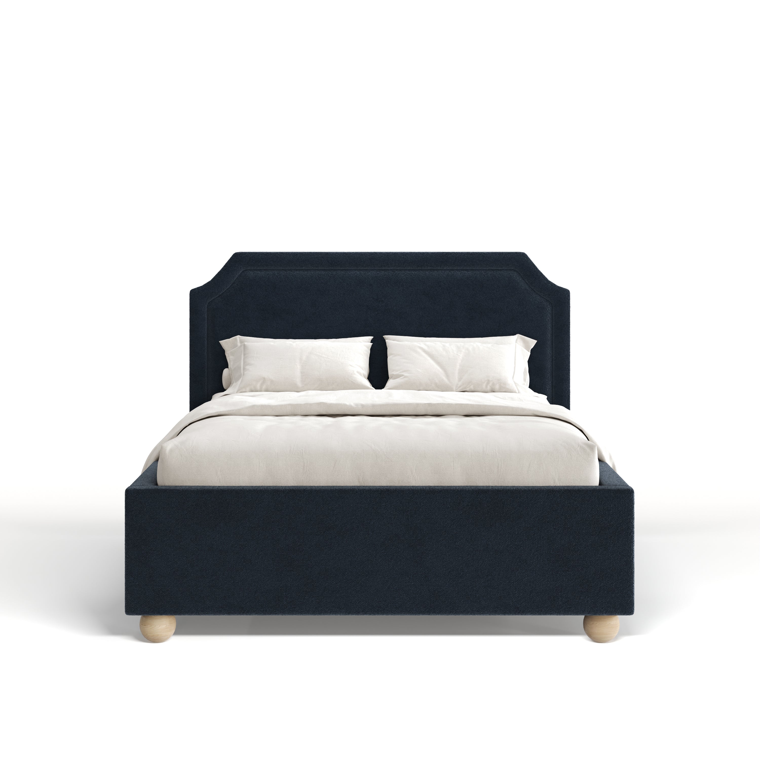 Navy bed with white bedding on a white background