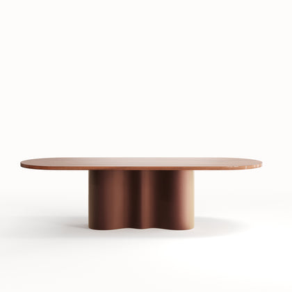 A contemporary brown wooden dining table with a wave-base design.